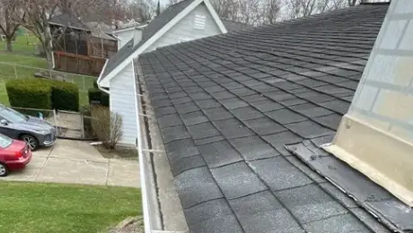 Hailstorm damage to roofs in Woodridge