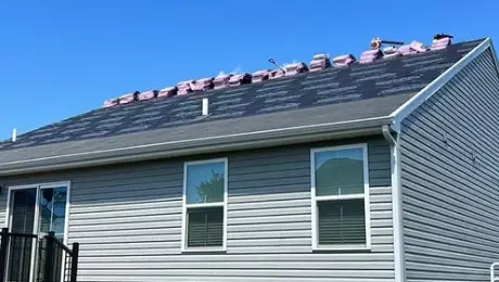 Strong winds damage roofs in Yorkville