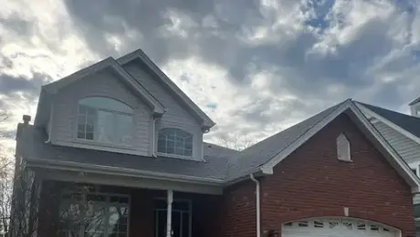Strong winds damage roofs in Hinsdale