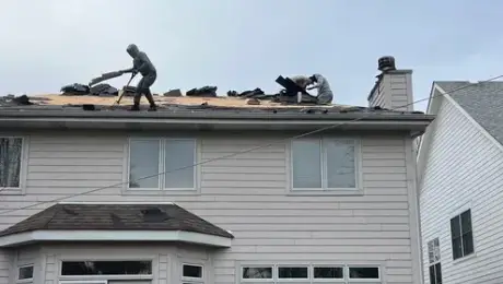 Heavy rainfall damages roofs in Hinsdale