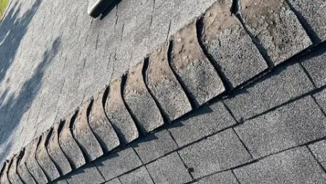 Roofs in Geneva damaged by ice storms