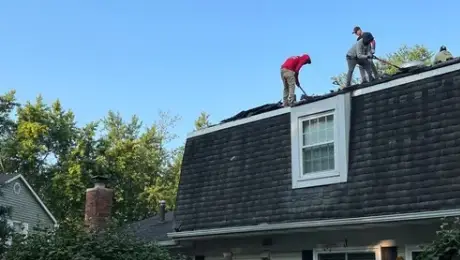 Strong winds damage roofs in Naperville
