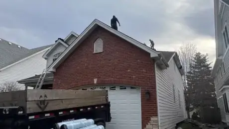 Heavy rainfall damages roofs in Woodridge