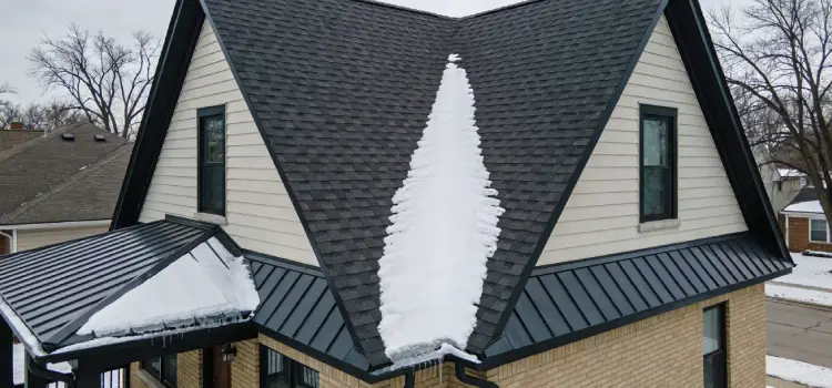 Right roof type: Boxer Exteriors matches gable+metal for snow shedding
